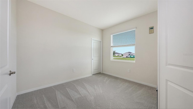 17817 Pastureland Ave, Lakewood Ranch, FL 34211 - spare room featuring light carpet and baseboards