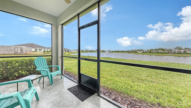 17817 Pastureland Ave, Lakewood Ranch, FL 34211 - sunroom featuring a water view, a ceiling fan, and plenty of natural light