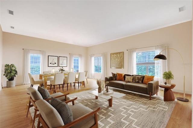 5839 Los Verdes Ct, Bradenton, FL 34210 - living area with light wood-style floors and baseboards