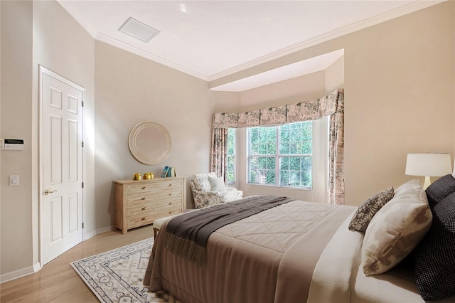 5839 Los Verdes Ct, Bradenton, FL 34210 - bedroom with crown molding and wood finished floors