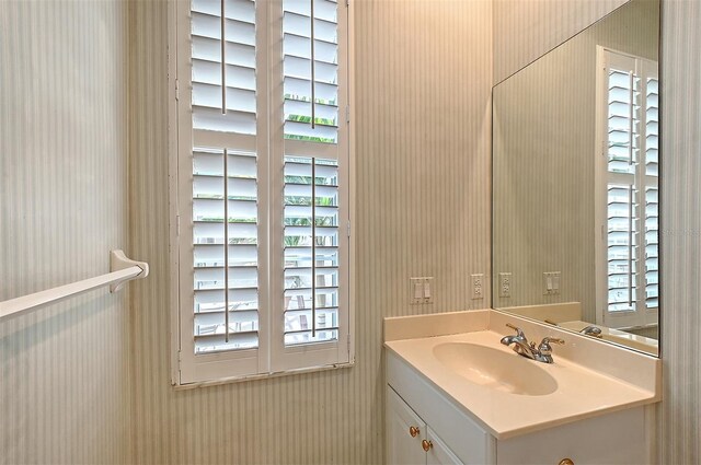 5839 Los Verdes Ct, Bradenton, FL 34210 - bathroom featuring vanity and wallpapered walls