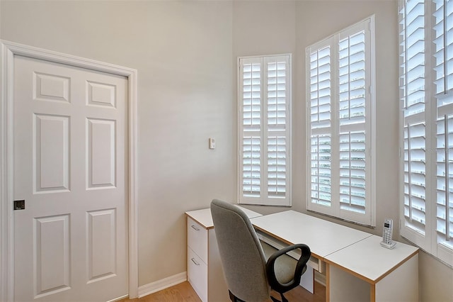 5839 Los Verdes Ct, Bradenton, FL 34210 - office area featuring baseboards and light wood-type flooring