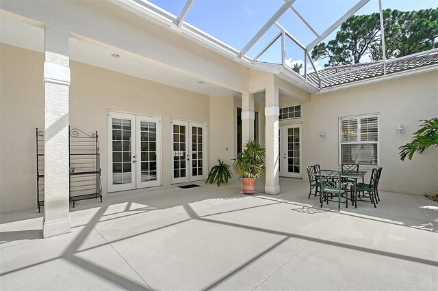 5839 Los Verdes Ct, Bradenton, FL 34210 - view of patio / terrace with french doors and glass enclosure