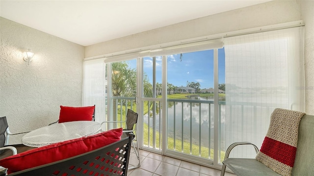 4211 Caddie Dr E Unit 202, Bradenton, FL 34203 - sunroom / solarium featuring a water view