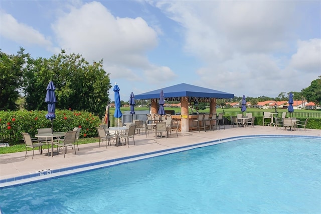 4211 Caddie Dr E Unit 202, Bradenton, FL 34203 - community pool featuring a patio area and a gazebo