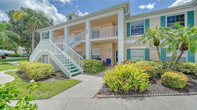 4211 Caddie Dr E Unit 202, Bradenton, FL 34203 - view of property featuring stairs