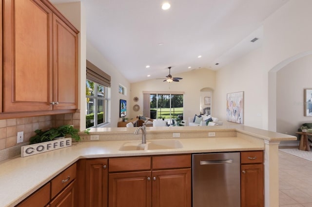 7419 Birds Eye Ter, Bradenton, FL 34203 - kitchen with dishwasher, open floor plan, arched walkways, lofted ceiling, and recessed lighting