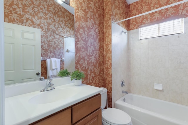 7419 Birds Eye Ter, Bradenton, FL 34203 - bathroom with wallpapered walls, vanity, and bathing tub / shower combination