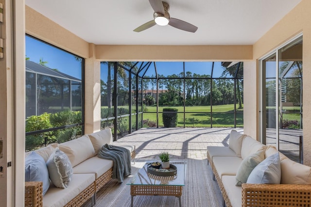 7419 Birds Eye Ter, Bradenton, FL 34203 - sunroom featuring an outdoor living space, a ceiling fan, and view of golf course