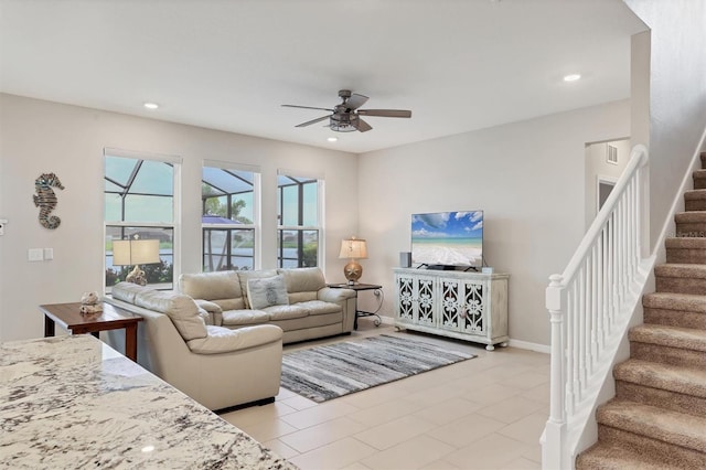 12564 Night View Dr, Sarasota, FL 34238 - living area featuring ceiling fan, stairs, and recessed lighting
