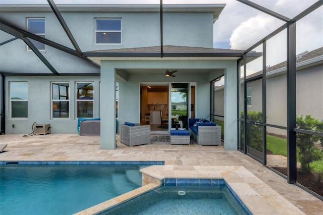 12564 Night View Dr, Sarasota, FL 34238 - back of house featuring stucco siding, a patio, and an in-ground hot tub