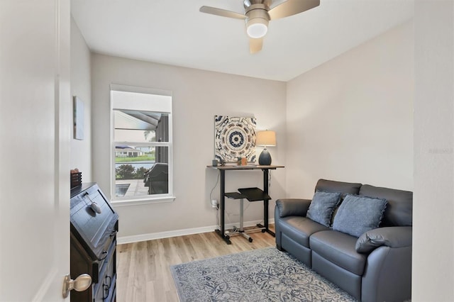 12564 Night View Dr, Sarasota, FL 34238 - living area with light wood-style flooring and a ceiling fan