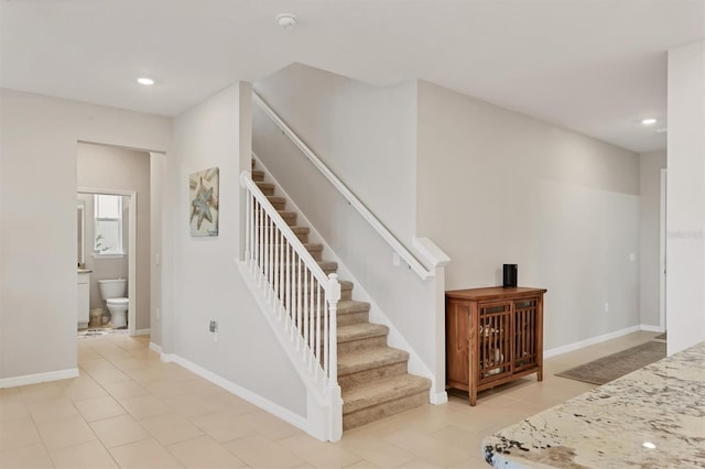 12564 Night View Dr, Sarasota, FL 34238 - staircase with tile patterned flooring and recessed lighting