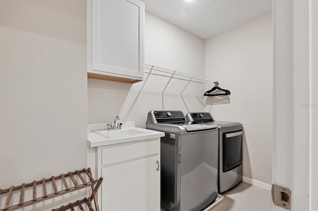 12564 Night View Dr, Sarasota, FL 34238 - laundry room featuring washing machine and clothes dryer and cabinet space