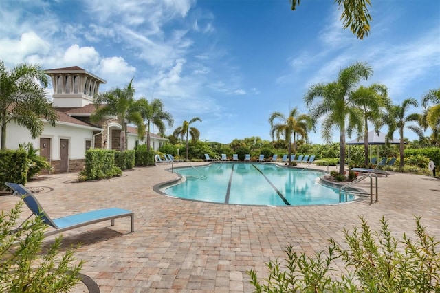 12564 Night View Dr, Sarasota, FL 34238 - community pool with a patio area