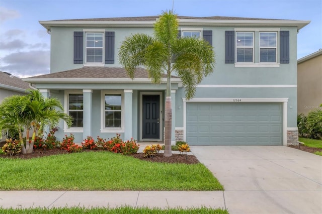 12564 Night View Dr, Sarasota, FL 34238 - traditional-style house with concrete driveway, an attached garage, stucco siding, a front lawn, and a porch