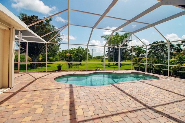 2148 Date Palm Way, Venice, FL 34292 - outdoor pool featuring a patio, a lawn, a lanai, and view of wooded area