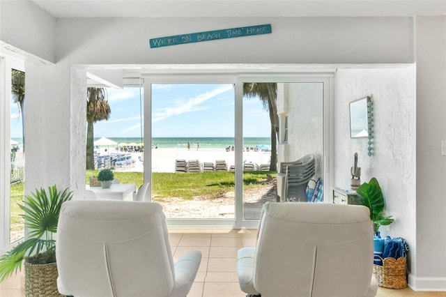 6312 Midnight Pass Rd Unit 102S, Sarasota, FL 34242 - tiled living room with a water view