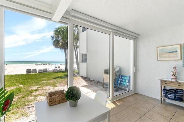6312 Midnight Pass Rd Unit 102S, Sarasota, FL 34242 - sunroom / solarium with view of water and beach