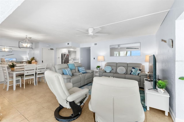 6312 Midnight Pass Rd Unit 102S, Sarasota, FL 34242 - living room with ceiling fan, light tile patterned floors, and a chandelier