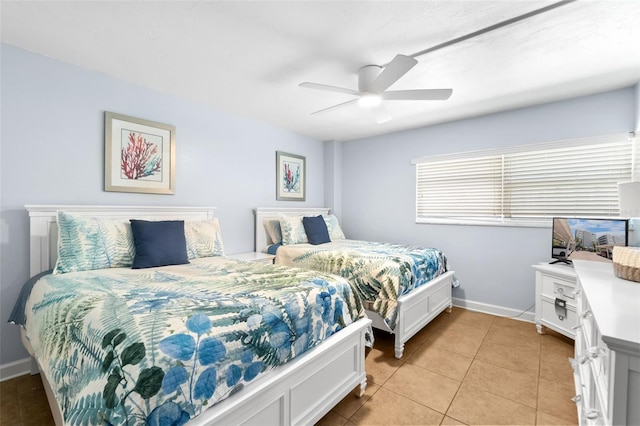 6312 Midnight Pass Rd Unit 102S, Sarasota, FL 34242 - bedroom featuring light tile patterned flooring and ceiling fan