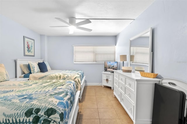 6312 Midnight Pass Rd Unit 102S, Sarasota, FL 34242 - bedroom with light tile patterned flooring and a ceiling fan