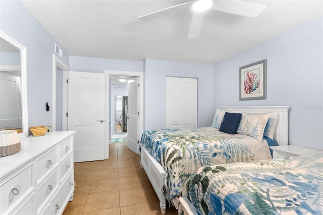 6312 Midnight Pass Rd Unit 102S, Sarasota, FL 34242 - bedroom with light tile patterned flooring, a closet, and ceiling fan