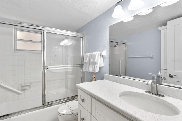 6312 Midnight Pass Rd Unit 102S, Sarasota, FL 34242 - bathroom with vanity, bath / shower combo with glass door, a textured ceiling, and a textured wall