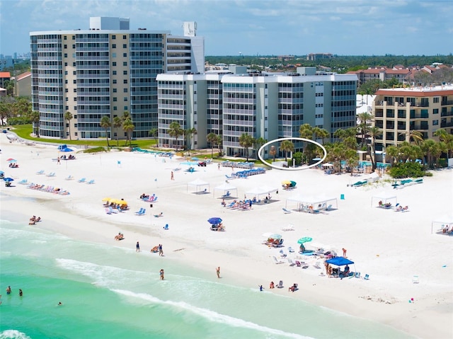 6312 Midnight Pass Rd Unit 102S, Sarasota, FL 34242 - drone / aerial view of unending shoreline and apartment complex / building