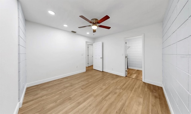 4455 Emerald Ridge Dr, Sarasota, FL 34233 - unfurnished bedroom featuring recessed lighting, light wood-type flooring, and a ceiling fan