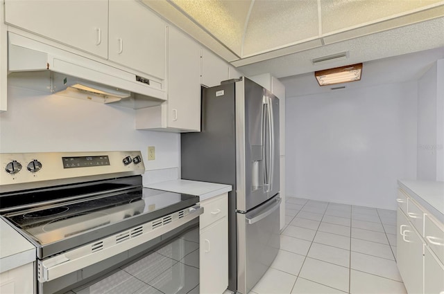 1144 Hoover St, Nokomis, FL 34275 - kitchen with stainless steel appliances, under cabinet range hood, light countertops, and light tile patterned flooring
