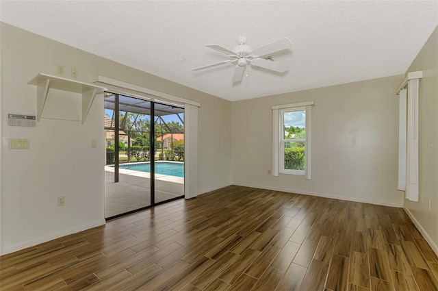 1144 Hoover St, Nokomis, FL 34275 - unfurnished room with wood finished floors and ceiling fan