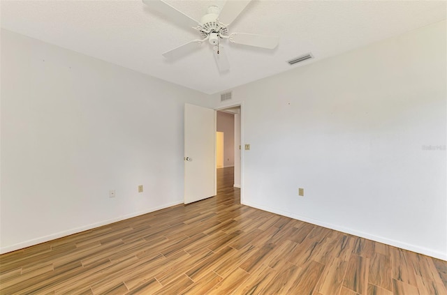 1144 Hoover St, Nokomis, FL 34275 - spare room featuring light wood finished floors and a ceiling fan