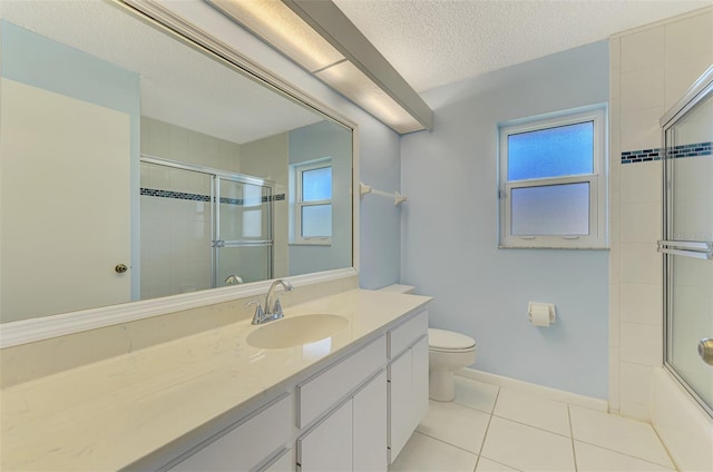 1144 Hoover St, Nokomis, FL 34275 - bathroom with vanity, tile patterned floors, a textured ceiling, and shower / bath combination with glass door