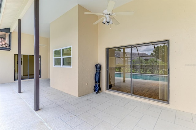 1144 Hoover St, Nokomis, FL 34275 - view of patio with a ceiling fan and an outdoor pool