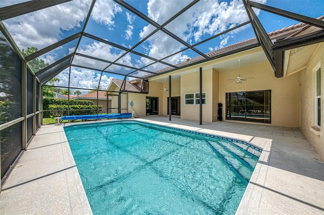 1144 Hoover St, Nokomis, FL 34275 - view of swimming pool featuring a covered pool, a patio, a ceiling fan, and a lanai