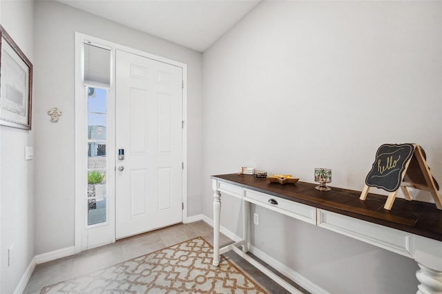 4405 Weathered Moss Gln, Palmetto, FL 34221 - foyer featuring baseboards and light tile patterned floors
