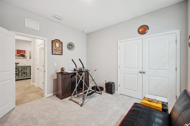4405 Weathered Moss Gln, Palmetto, FL 34221 - workout room featuring carpet and baseboards