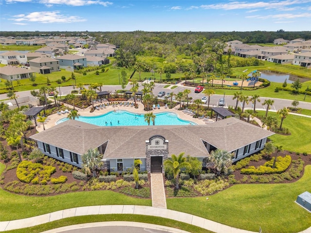 4405 Weathered Moss Gln, Palmetto, FL 34221 - aerial view of residential area with a pool and a large body of water