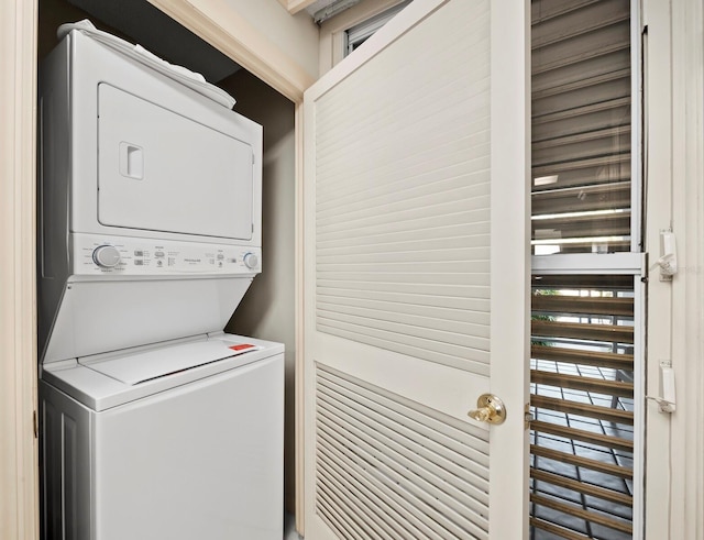 615 Dream Island Pl Unit 105, Longboat Key, FL 34228 - washroom with estacked washer and dryer