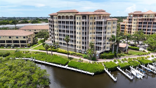 1921 Monte Carlo Dr Unit 302, Sarasota, FL 34231 - view of apartment building / complex featuring a water view