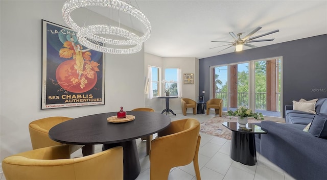 1921 Monte Carlo Dr Unit 302, Sarasota, FL 34231 - tiled dining area featuring ceiling fan and a chandelier