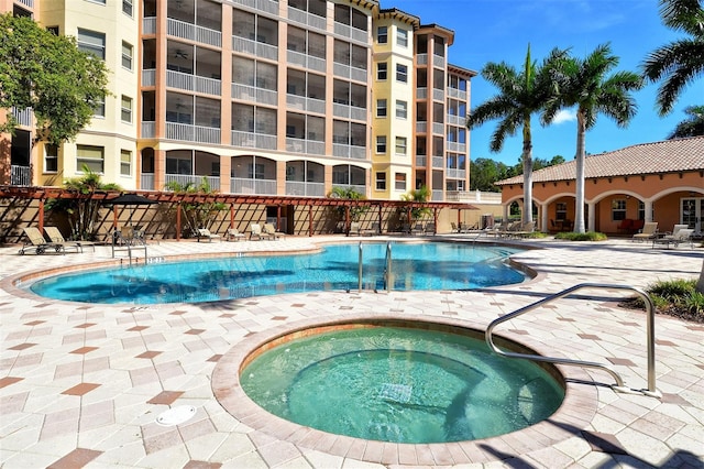 1921 Monte Carlo Dr Unit 302, Sarasota, FL 34231 - community pool featuring a hot tub and a patio