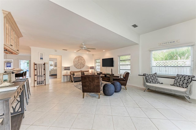 160 Coolidge Dr, Sarasota, FL 34236 - living area featuring light tile patterned flooring and ceiling fan