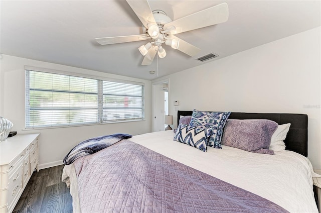160 Coolidge Dr, Sarasota, FL 34236 - bedroom with dark wood-type flooring and ceiling fan