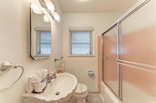 160 Coolidge Dr, Sarasota, FL 34236 - bathroom with toilet and combined bath / shower with glass door