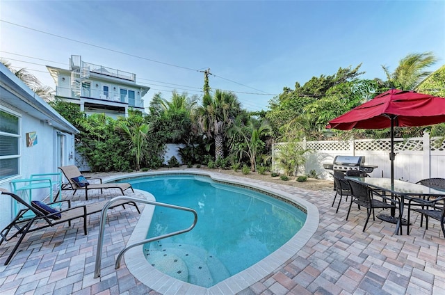 160 Coolidge Dr, Sarasota, FL 34236 - view of pool featuring a patio, outdoor dining space, and a grill