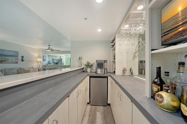 1740 Alderman St Unit 7, Sarasota, FL 34236 - kitchen featuring light wood-type flooring, a ceiling fan, recessed lighting, and white cabinetry