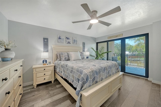 1740 Alderman St Unit 7, Sarasota, FL 34236 - bedroom featuring access to exterior, wood finished floors, and ceiling fan