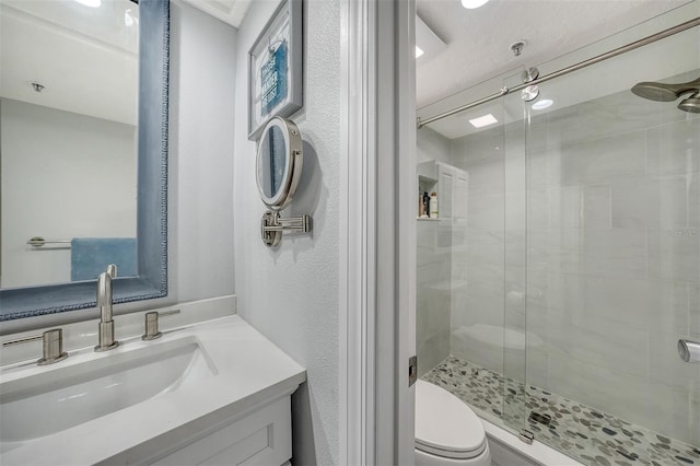 1740 Alderman St Unit 7, Sarasota, FL 34236 - bathroom with a shower stall, vanity, and a textured wall